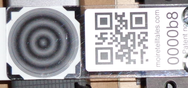 Moiré Tell Tale showing centred concentric circular fringes